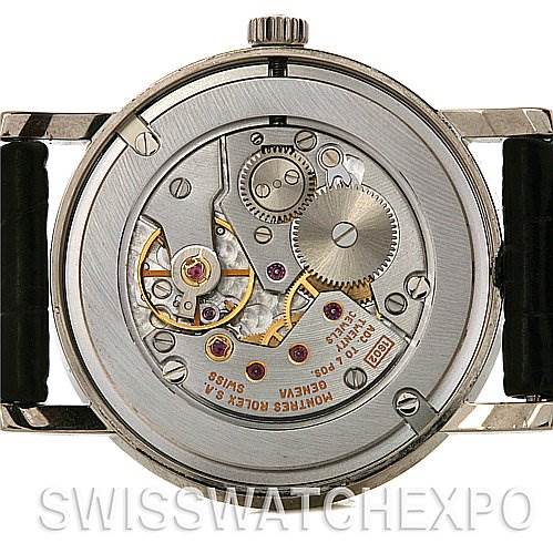 This image shows the back of a Rolex Cellini 5115/9 White Gold Silver Dial 5115/9 White Gold Silver Dial watch, highlighting its internal mechanical movement components.