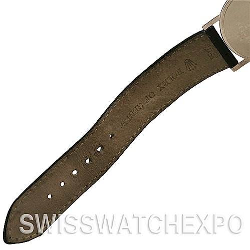 The image shows a close-up of the leather strap and clasp attachment of a Rolex Cellini 5115/9 White Gold Silver Dial 5115/9 White Gold Silver Dial watch.