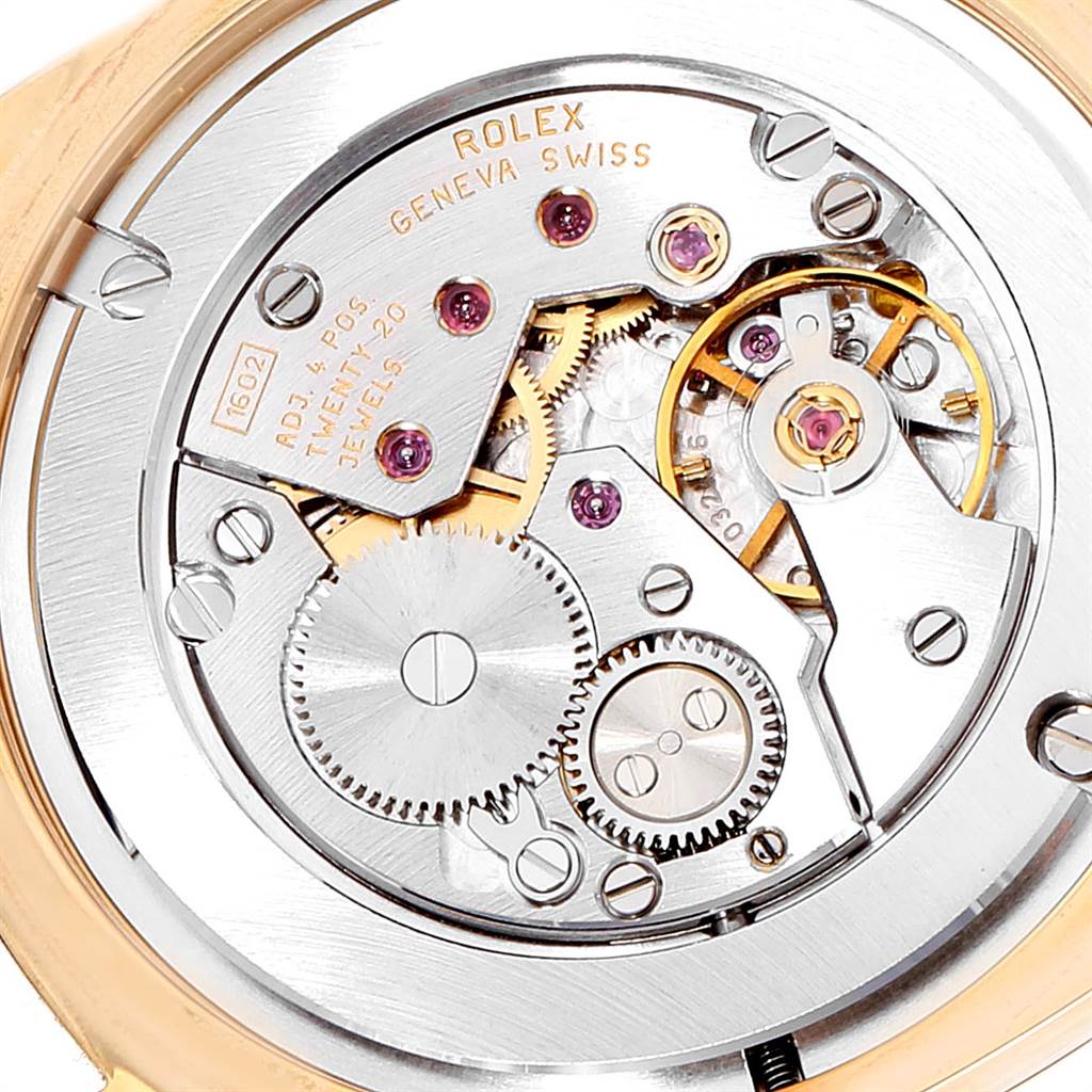 This image shows the intricate internal mechanism of the Rolex Cellini 4233 Men's Yellow Gold White Dial 4233 Men's Yellow Gold White Dial watch at a close-up, angled view.