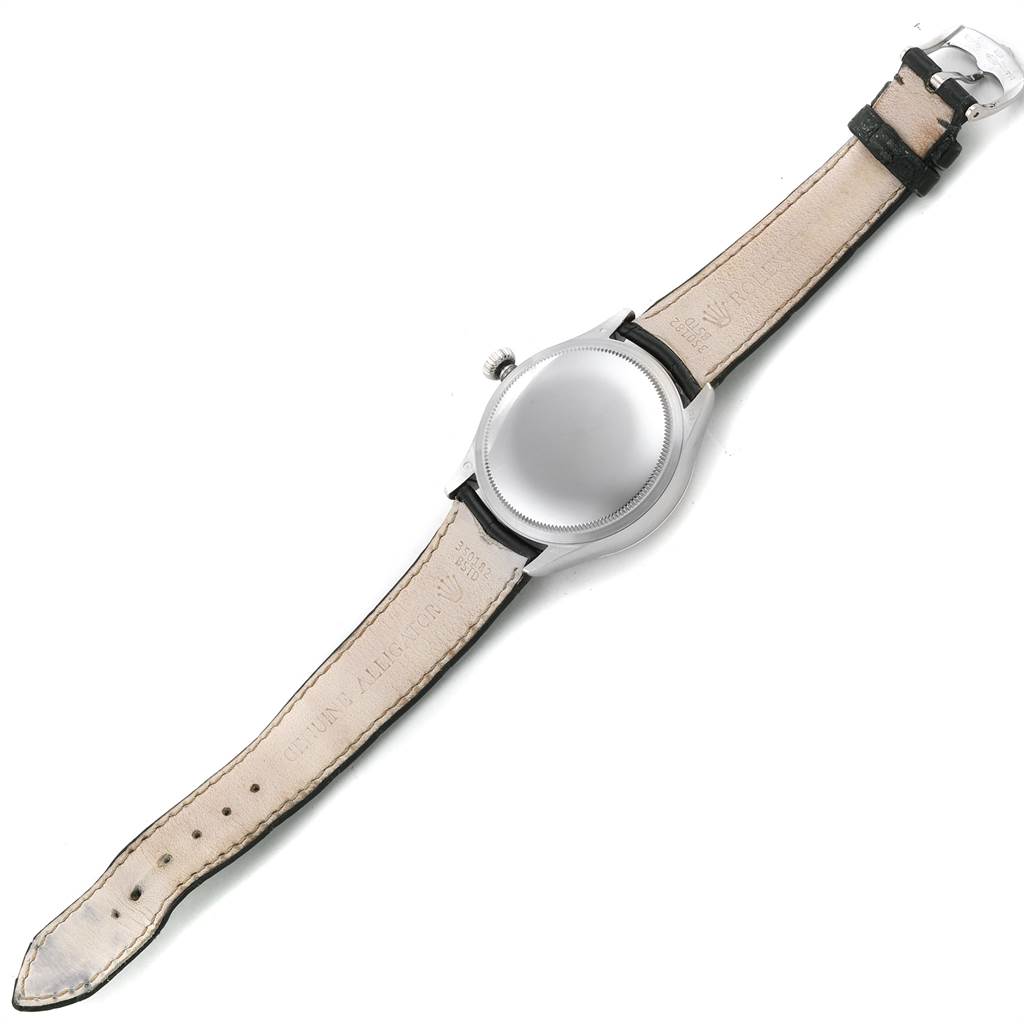 This image shows the back and strap of a Rolex Cellini 50529 Men
s White Gold Silver Dial 50529 Men
s White Gold Silver Dial watch laid flat, viewed from the inside.