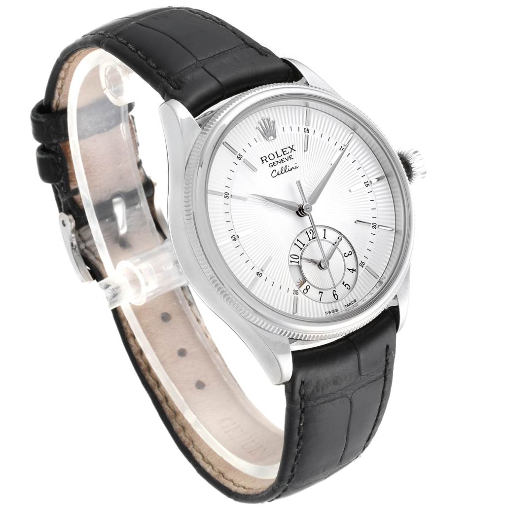 The Rolex Cellini 50529 Men
s White Gold Silver Dial 50529 Men
s White Gold Silver Dial watch is shown at a slight angle, displaying its white dial, black leather strap, and silver casing.