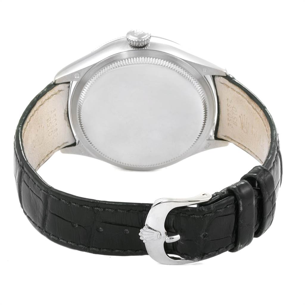 This image shows the back of a Rolex Cellini 50529 Men
s White Gold Silver Dial 50529 Men
s White Gold Silver Dial watch, highlighting its case back, crown, and leather strap with buckle.