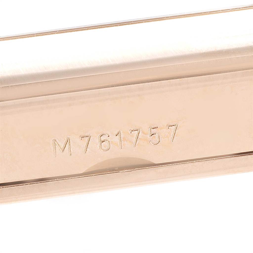 This image shows the side of a Rolex Cellini 5442/5 Men's Rose Gold Black Dial 5442/5 Men's Rose Gold Black Dial model watch, focusing on the serial number engraving.