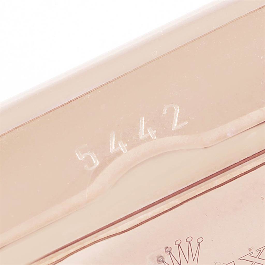 This close-up image shows part of the case back of a Rolex Cellini 5442/5 Men's Rose Gold Black Dial 5442/5 Men's Rose Gold Black Dial watch, highlighting the engraving "5442."