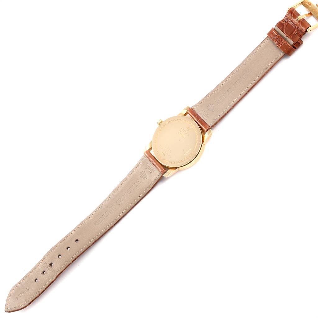 The image shows the back and strap of a Rolex Cellini 5116 Men's Yellow Gold Beige Dial 5116 Men's Yellow Gold Beige Dial model watch, viewed from a top-down angle.