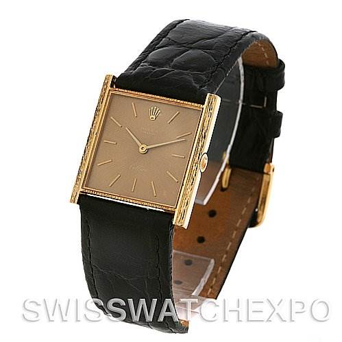 The image shows a Rolex Cellini 4014 Men's Yellow Gold Brown Dial 4014 Men's Yellow Gold Brown Dial watch at a slight angle from above, highlighting its rectangular face, gold case, and black leather strap.