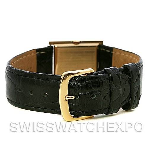 The image shows a rear view of a Rolex Cellini 4014 Men's Yellow Gold Brown Dial 4014 Men's Yellow Gold Brown Dial watch with a black leather strap and gold buckle.