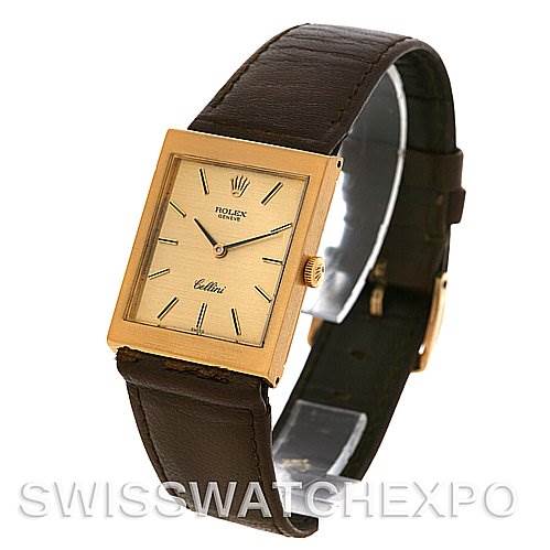 This image shows the clear front and side view of a Rolex Cellini 4014 Men
s Yellow Gold Champagne Dial 4014 Men
s Yellow Gold Champagne Dial watch, highlighting its rectangular face and dark leather strap.