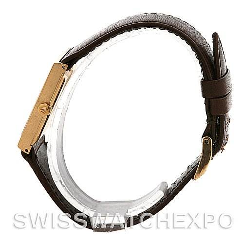 This image shows the side view of a Rolex Cellini 4014 Men
s Yellow Gold Champagne Dial 4014 Men
s Yellow Gold Champagne Dial watch, focusing on the leather strap and clasp.