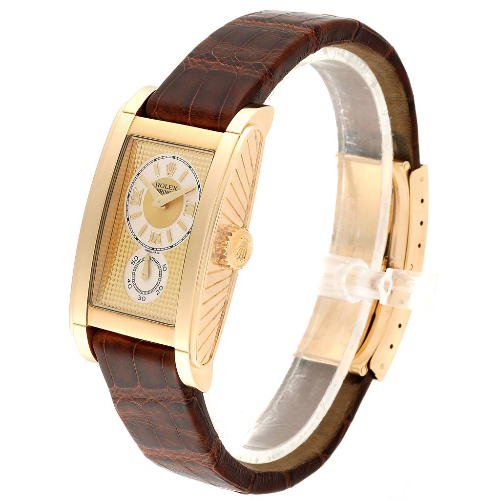 The Rolex Cellini 5440/8 Men's Yellow Gold Champagne Dial 5440/8 Men's Yellow Gold Champagne Dial watch is shown at an angled side view, highlighting its dial, crown, case, and leather strap.