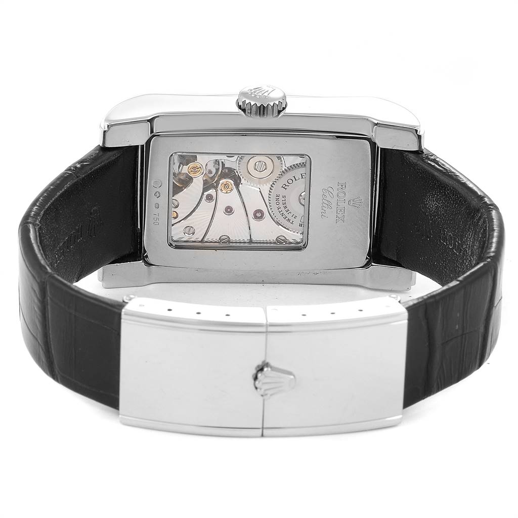 The image shows the back of a Rolex Cellini 5443/9 Men's White Gold Black Dial 5443/9 Men's White Gold Black Dial watch, highlighting its movement through a transparent case back and its leather strap.
