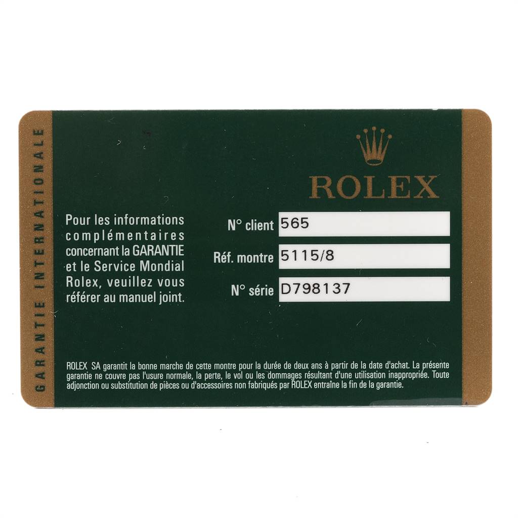 The image shows a green and gold warranty card for the Rolex Cellini 5115 Yellow Gold Mother of Pearl Dial 5115 Yellow Gold Mother of Pearl Dial model.
