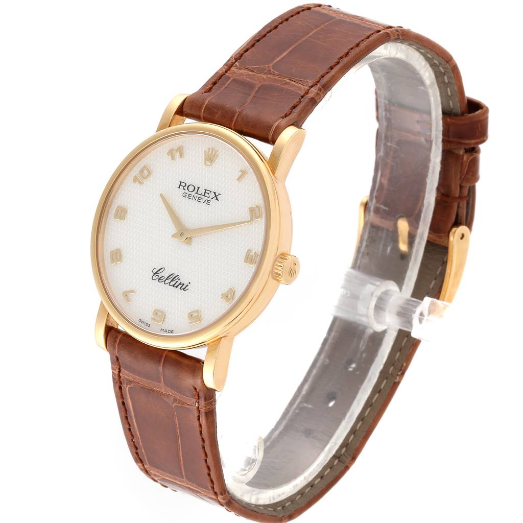 The Rolex Cellini 5115 Yellow Gold Mother of Pearl Dial 5115 Yellow Gold Mother of Pearl Dial watch is shown at a three-quarter angle, highlighting the dial, case, and brown leather strap.