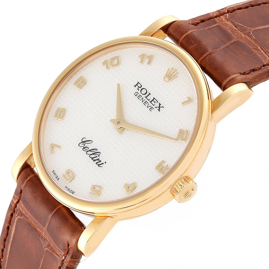 The image shows a Rolex Cellini 5115 Yellow Gold Mother of Pearl Dial 5115 Yellow Gold Mother of Pearl Dial watch at a slight angle highlighting its face, bezel, crown, and leather strap.