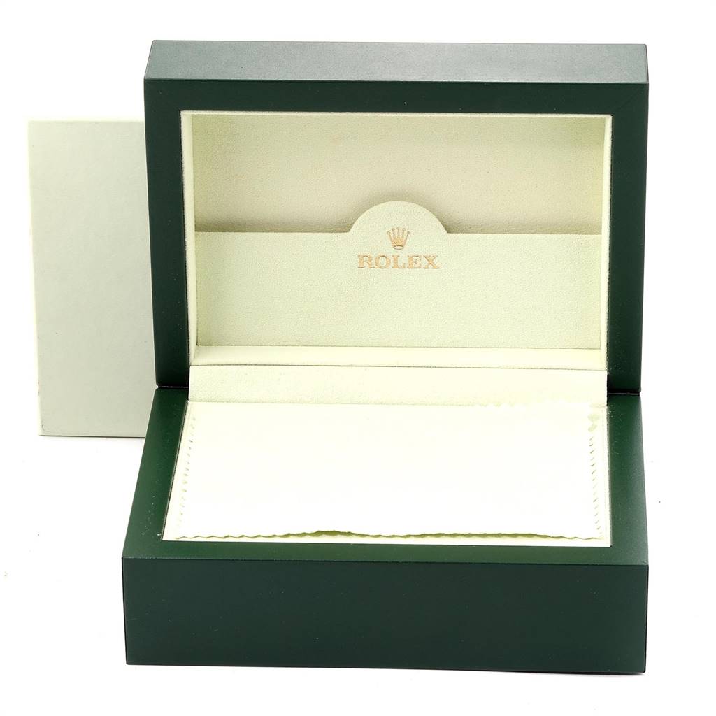 The image shows an open Rolex watch box for the Cellini model, displaying the inner compartment designed to hold the watch.