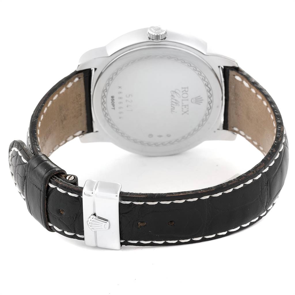 The image shows the back and strap of a Rolex Cellini 5241 Men
s Platinum Black Dial 5241 Men
s Platinum Black Dial watch at an angle highlighting the clasp and rear casing.
