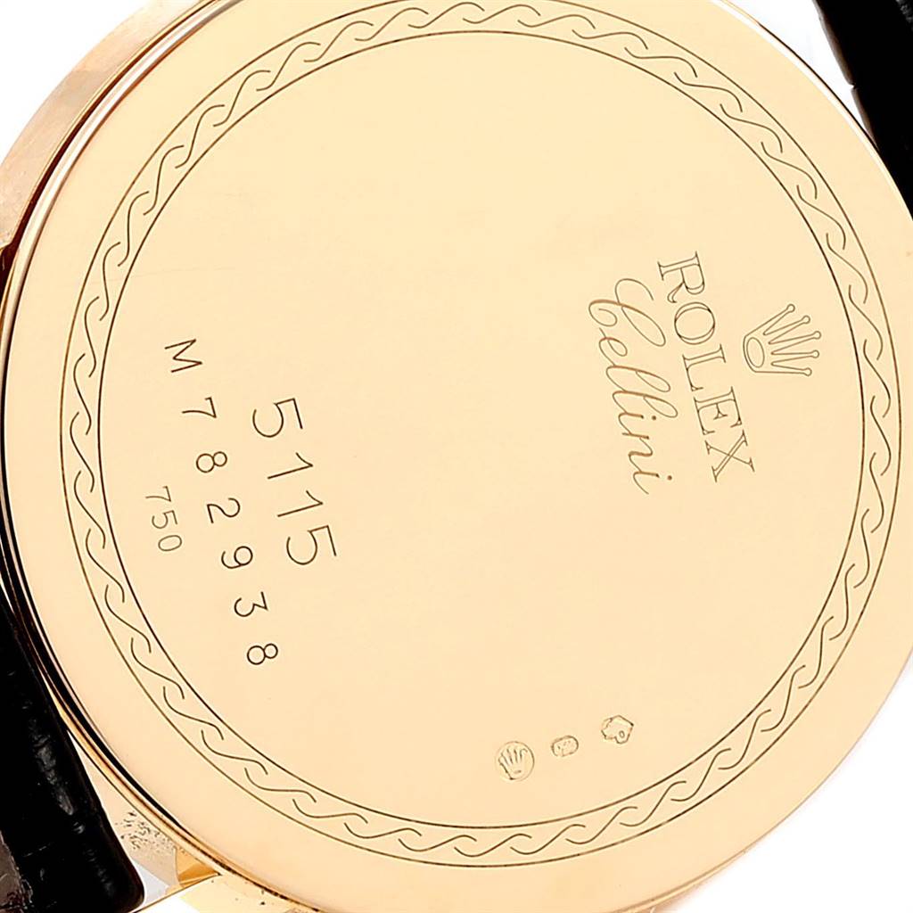 The image shows the back case of a Rolex Cellini 5115 Men's Yellow Gold Beige Dial 5115 Men's Yellow Gold Beige Dial watch, displaying its model number and unique engravings.