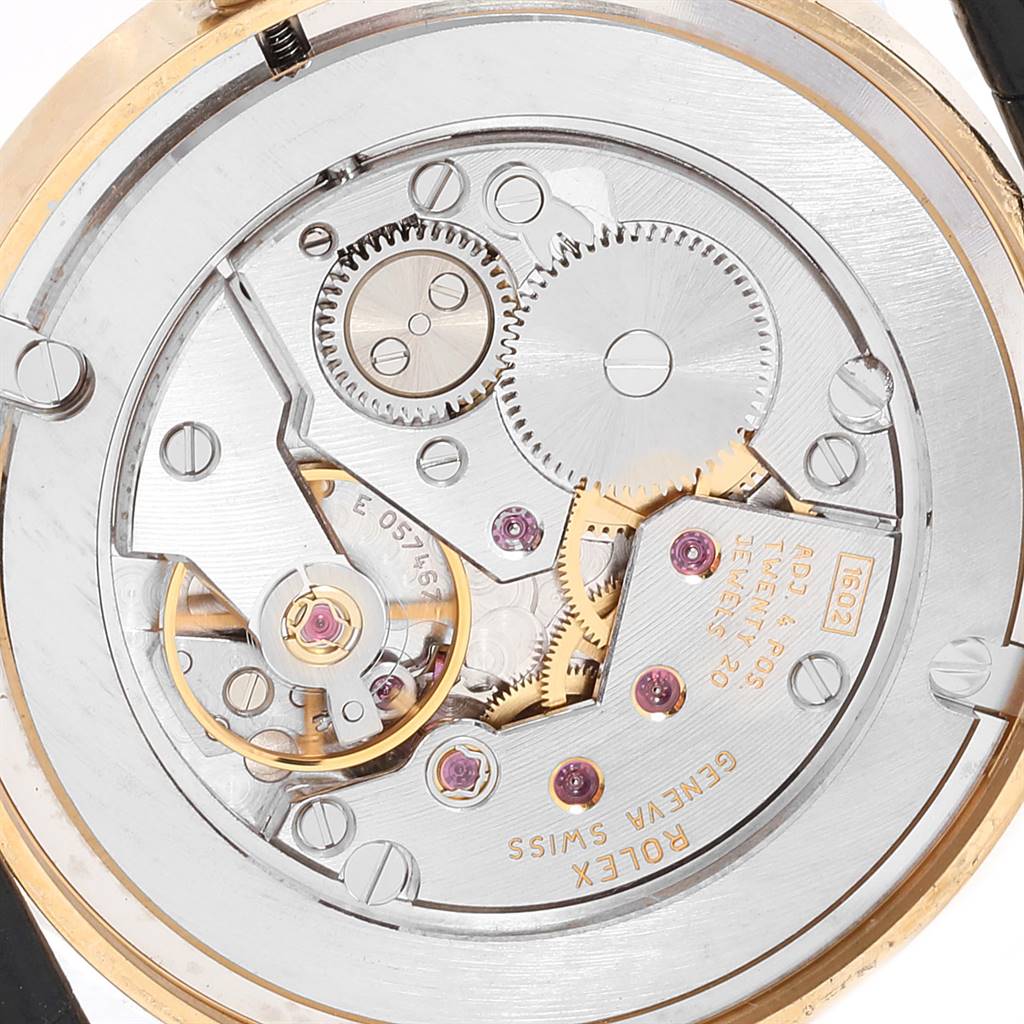 This image shows a close-up view of the movement mechanism inside a Rolex Cellini 5115 Men's Yellow Gold Beige Dial 5115 Men's Yellow Gold Beige Dial watch.