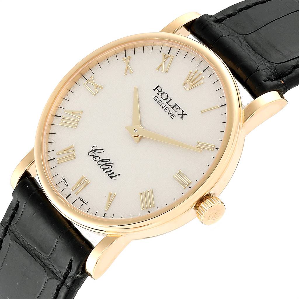 The image shows a Rolex Cellini 5115 Men's Yellow Gold Beige Dial 5115 Men's Yellow Gold Beige Dial watch at a slight angle, highlighting its gold case, white dial with Roman numerals, and black leather strap.