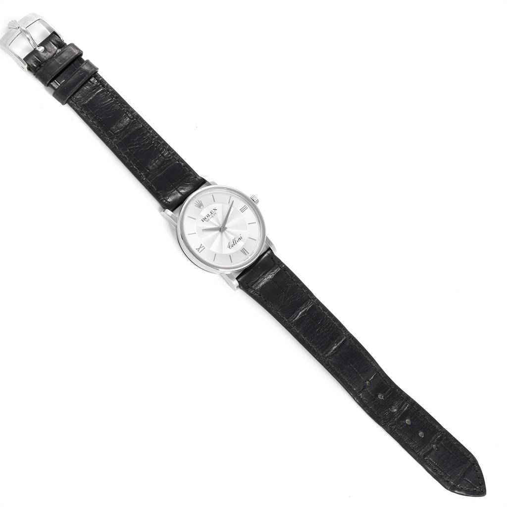 This image shows a Rolex Cellini 5115 Men's White Gold Silver Dial 5115 Men's White Gold Silver Dial watch from a top-down angle, displaying the face, leather strap, and buckle.