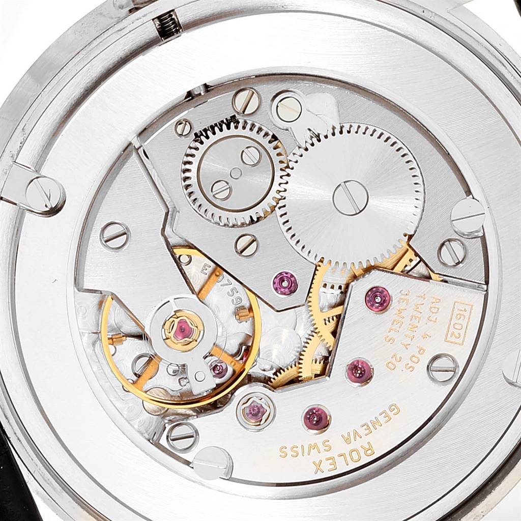 This image shows the intricate inner mechanism of the Rolex Cellini 5115 Men's White Gold Silver Dial 5115 Men's White Gold Silver Dial watch, focusing on the movement components.