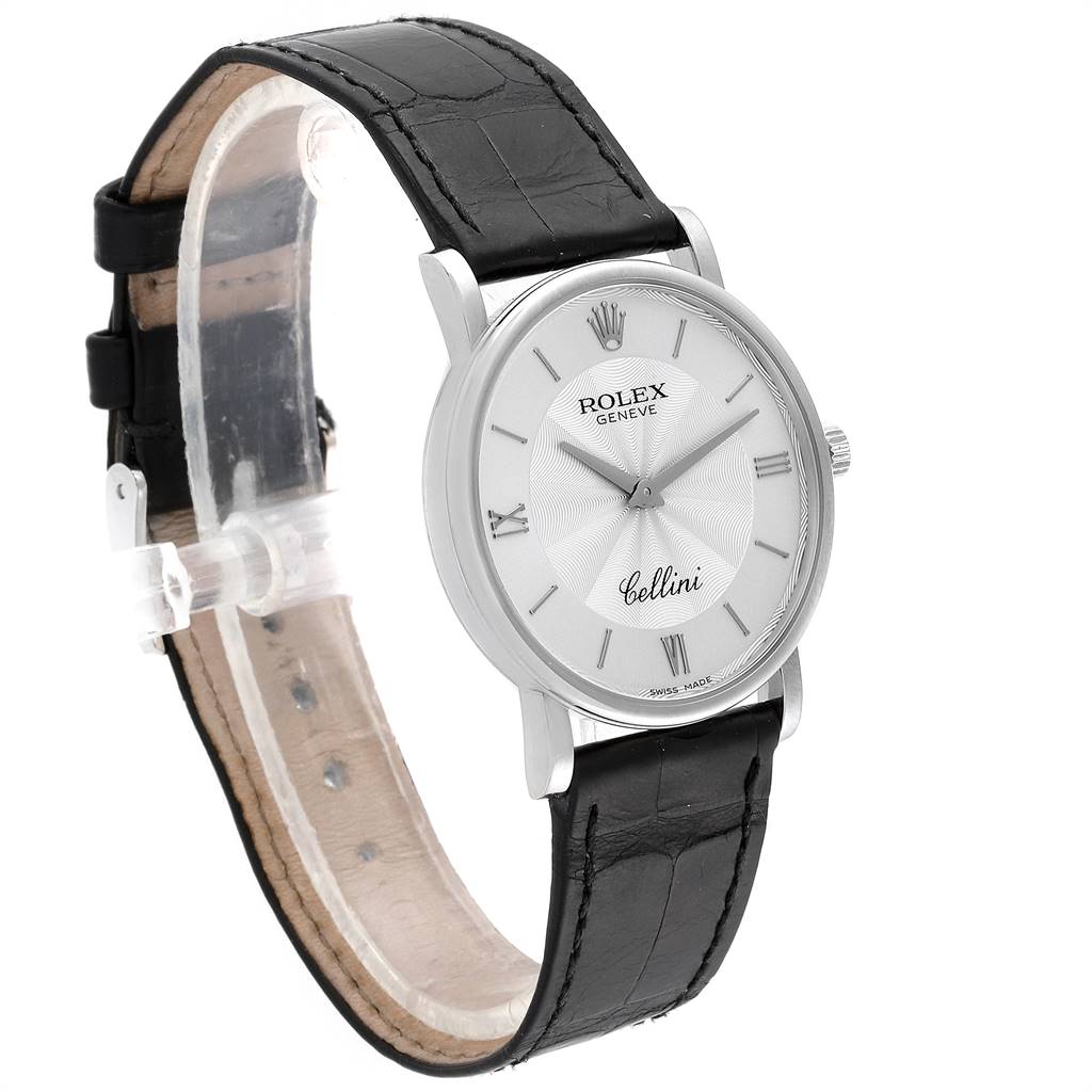 The Rolex Cellini 5115 Men's White Gold Silver Dial 5115 Men's White Gold Silver Dial watch is shown at a slight angle, displaying its face, crown, and black leather strap.