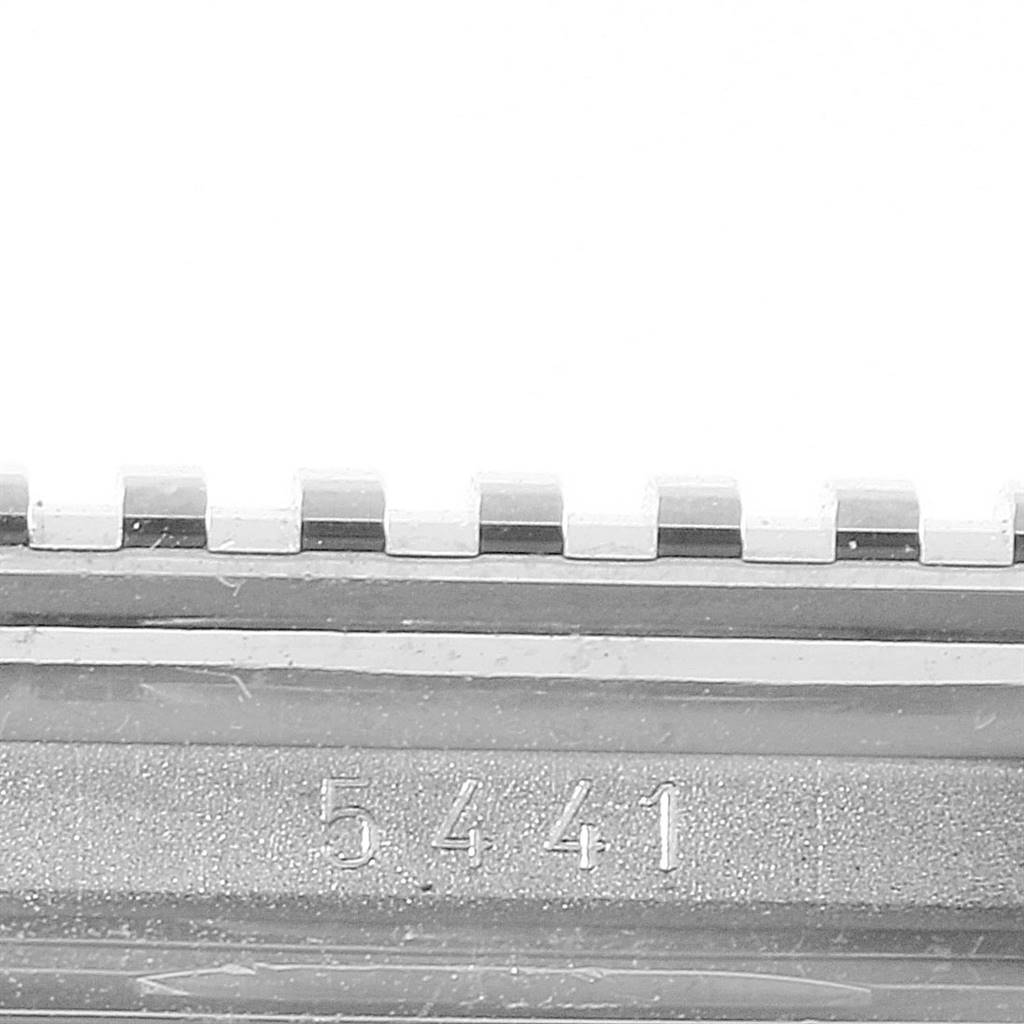 This image shows a close-up of the watch band and part of the casing with the model number 5441 for a Rolex Cellini 5441 Men's White Gold Silver Dial 5441 Men's White Gold Silver Dial.