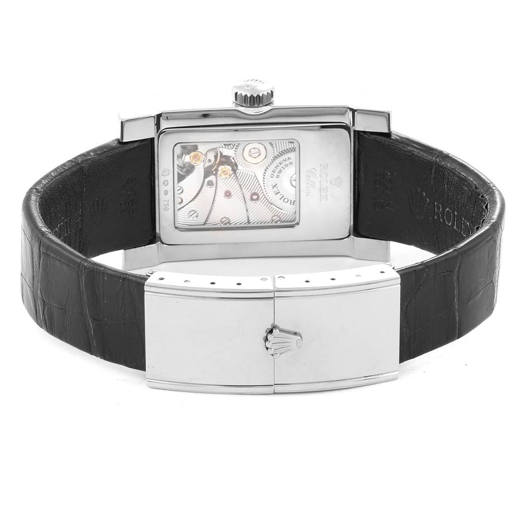 The image shows the back view of a Rolex Cellini 5441 Men's White Gold Silver Dial 5441 Men's White Gold Silver Dial watch, highlighting its movement, case back, and leather strap with a clasp.