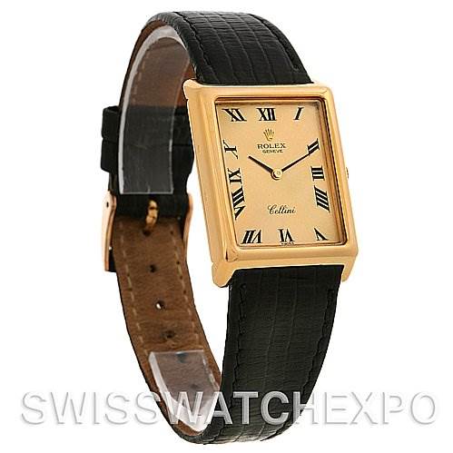 This image shows a Rolex Cellini 4105 Men's Yellow Gold Champagne Dial 4105 Men's Yellow Gold Champagne Dial watch at a slight angle, displaying its rectangular gold case, black leather strap, and Roman numeral dial.