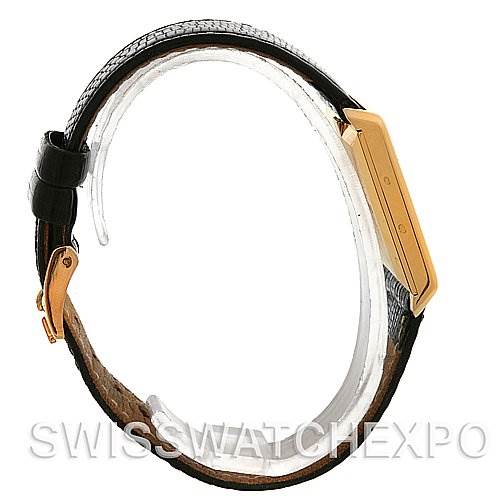 Side view of a Rolex Cellini 4105 Men's Yellow Gold Champagne Dial 4105 Men's Yellow Gold Champagne Dial watch showing the rectangular case, strap, and clasp.