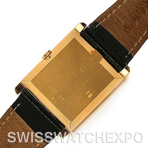 The image shows the back of a Rolex Cellini 4105 Men's Yellow Gold Champagne Dial 4105 Men's Yellow Gold Champagne Dial watch with its leather strap and gold case.