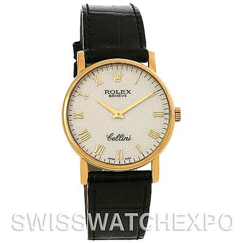 The image shows a frontal view of a Rolex Cellini 5115 Men's Yellow Gold Beige Dial 5115 Men's Yellow Gold Beige Dial watch, highlighting its gold casing, white dial, and black leather strap.