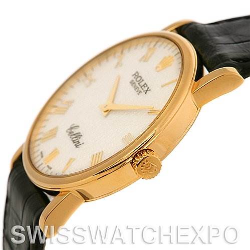 This image shows a side angle of a Rolex Cellini 5115 Men's Yellow Gold Beige Dial 5115 Men's Yellow Gold Beige Dial watch, highlighting its gold case, crown, and leather strap.