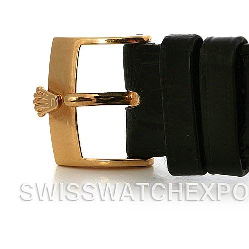 The image shows a close-up of a black leather strap and gold-tone buckle of a Rolex Cellini 5115 Men's Yellow Gold Beige Dial 5115 Men's Yellow Gold Beige Dial watch.