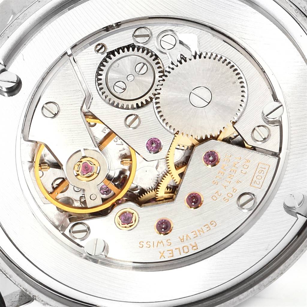 The image shows the intricate internal movement of a Rolex Cellini 5116 Men's White Gold Grey Dial 5116 Men's White Gold Grey Dial watch viewed from the back case.