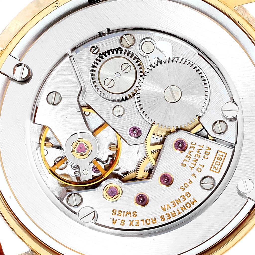 The image shows a close-up of the internal mechanism and movement of the Rolex Cellini 5116 Men's Yellow Gold Champagne Dial 5116 Men's Yellow Gold Champagne Dial watch.