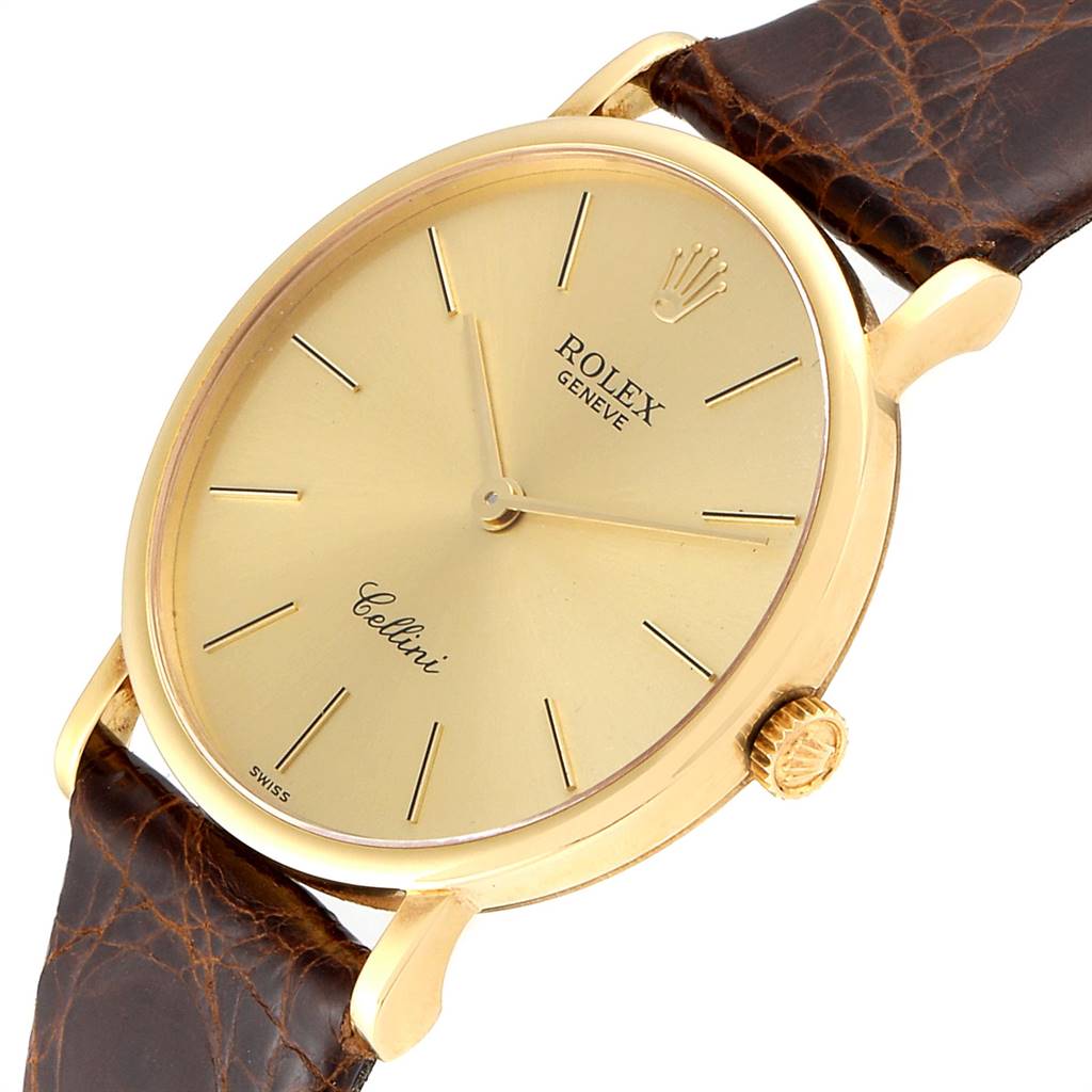 This image shows a Rolex Cellini 5112 Men's Yellow Gold Champagne Dial 5112 Men's Yellow Gold Champagne Dial watch from a front angle, highlighting its gold case, dial, crown, and brown leather strap.