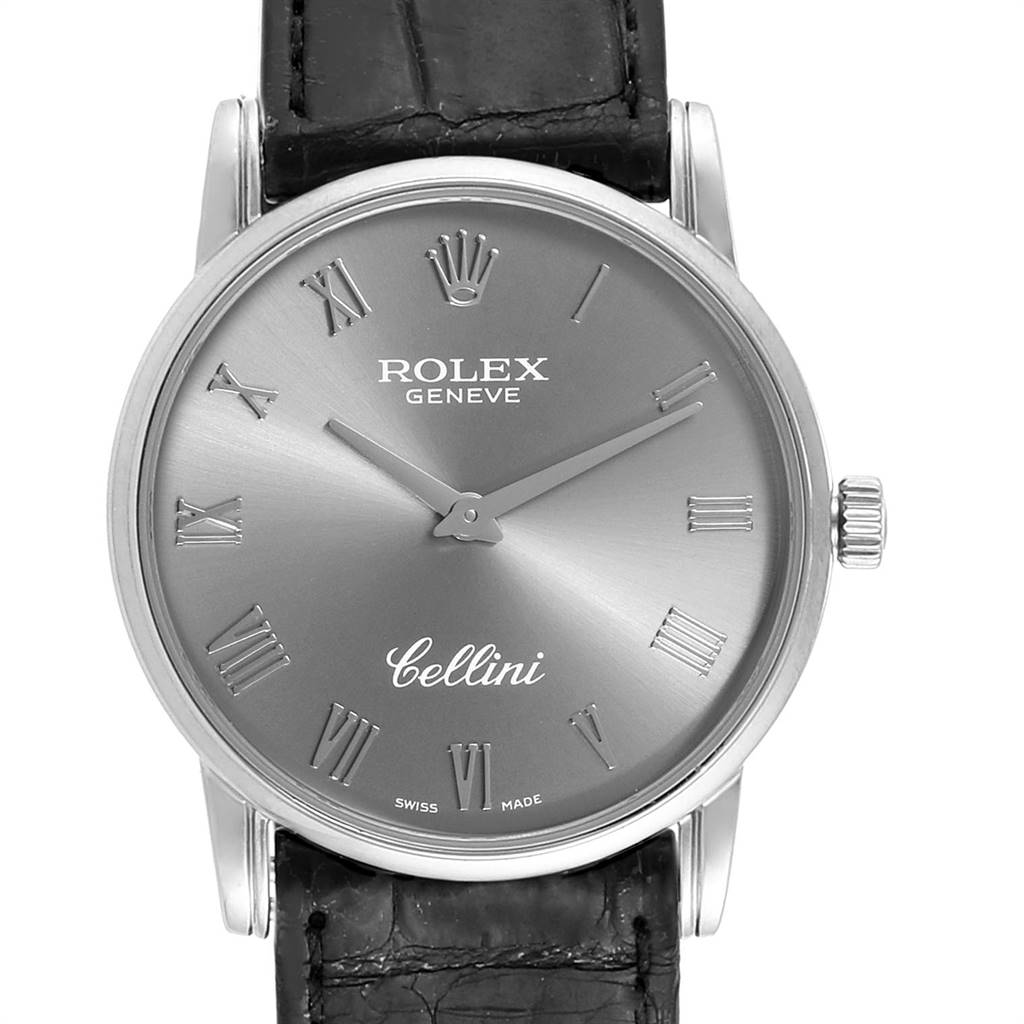 This image shows a front view of a Rolex Cellini 5116 Men's White Gold Grey Dial 5116 Men's White Gold Grey Dial watch displaying its face, Roman numerals, and part of the leather strap.