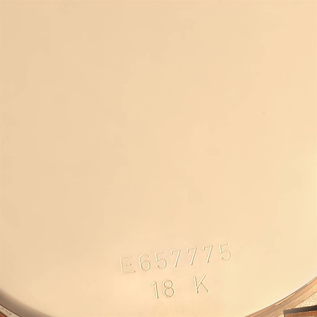 The image shows the back case of a Rolex Cellini 6623 Men's Yellow Gold White Dial 6623 Men's Yellow Gold White Dial watch, highlighting its serial number and 18K gold marking.