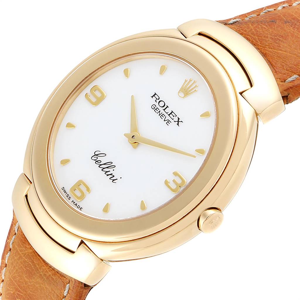 The Rolex Cellini 6623 Men's Yellow Gold White Dial 6623 Men's Yellow Gold White Dial watch is shown at an angled view, featuring its dial, golden case, crown, and leather strap.