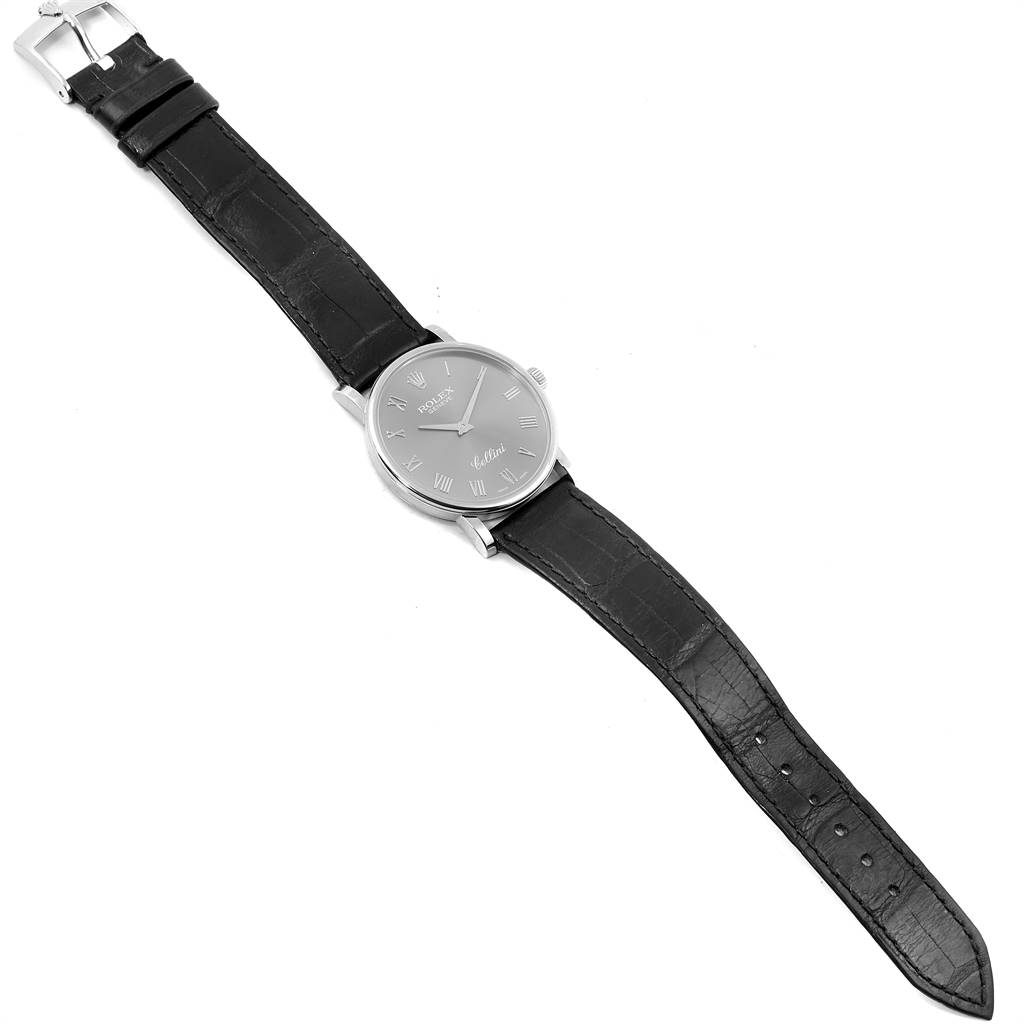 This image shows a full view of the Rolex Cellini 5115 Men's White Gold Grey Dial 5115 Men's White Gold Grey Dial model watch, highlighting its black leather strap and round face with Roman numerals.