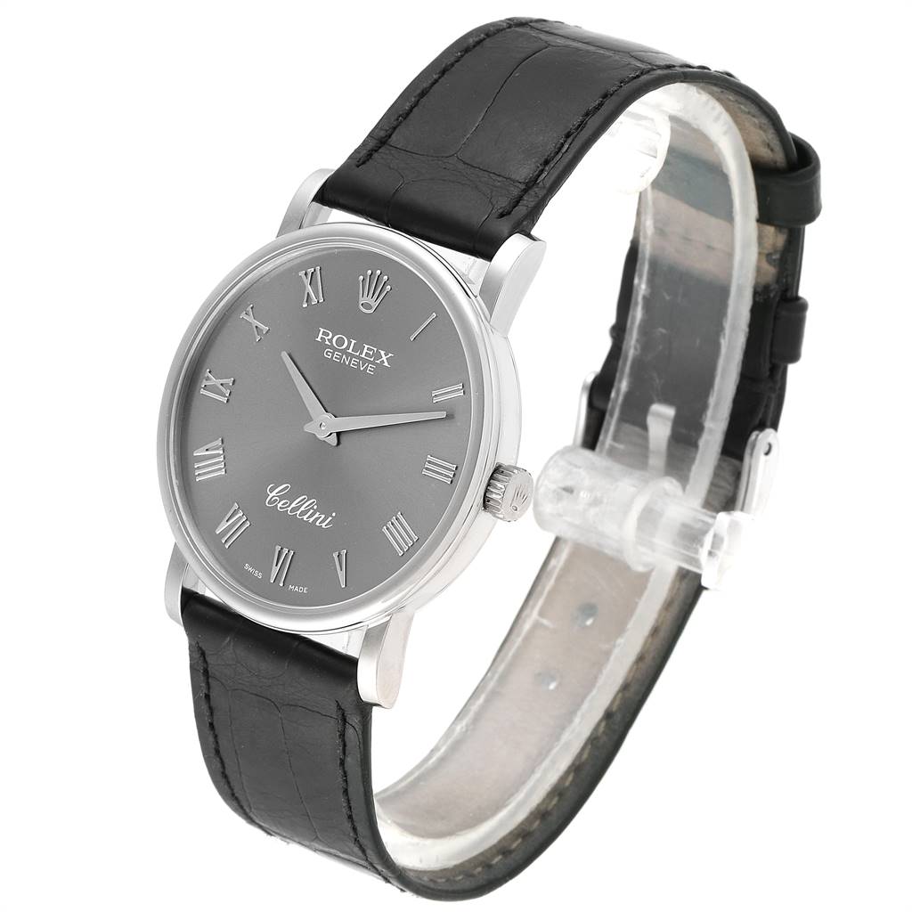 The image shows a Rolex Cellini 5115 Men's White Gold Grey Dial 5115 Men's White Gold Grey Dial watch at a three-quarter angle, highlighting its face, leather strap, and side crown.