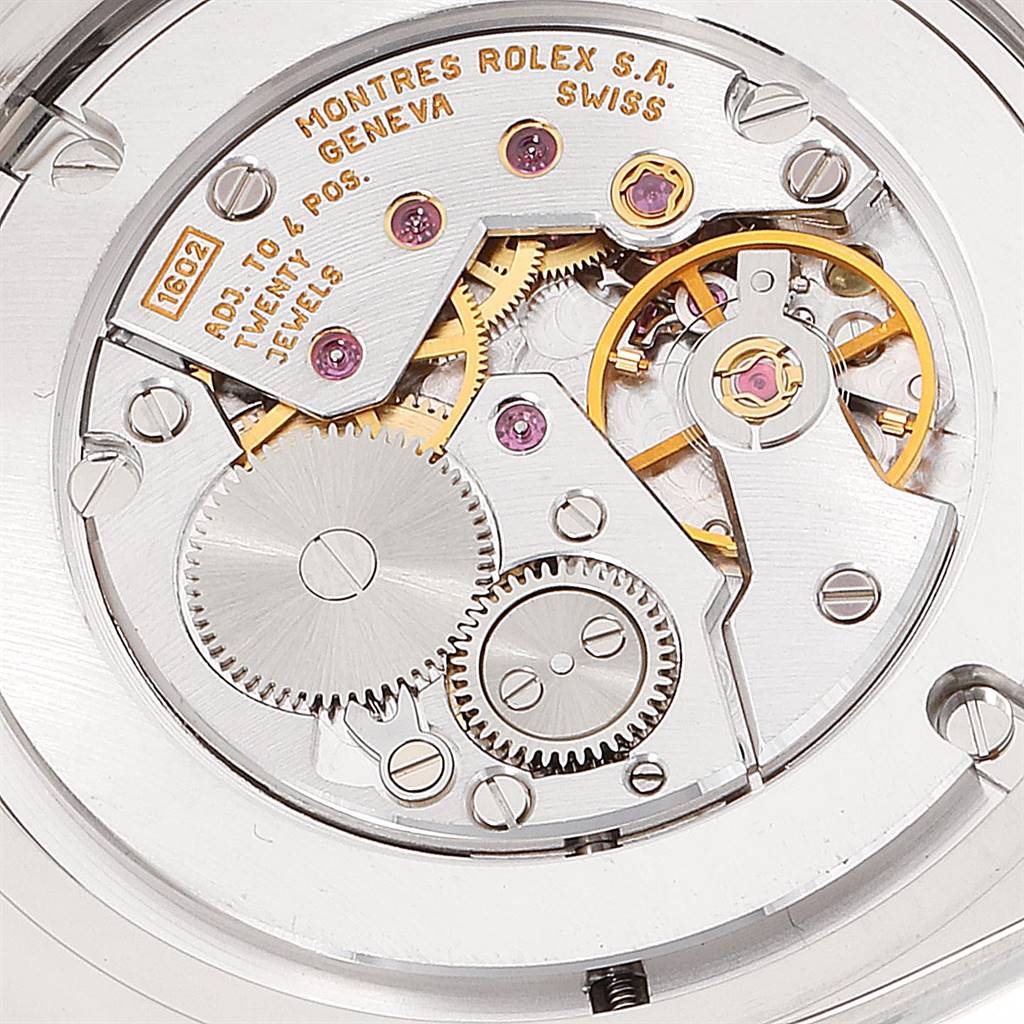This image shows the intricate movement and gears of a Rolex Cellini 4233 Men
s White Gold Black Dial 4233 Men
s White Gold Black Dial watch observed from the back side.