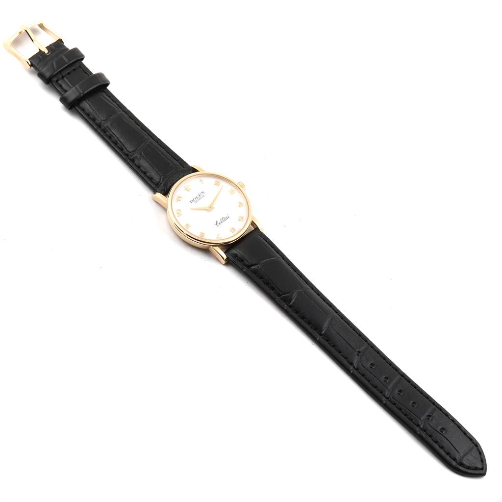 The Rolex Cellini 5115 Men's Yellow Gold Mother of Pearl Dial 5115 Men's Yellow Gold Mother of Pearl Dial watch is shown from a top-down angle, displaying the full face, watchband, and buckle.