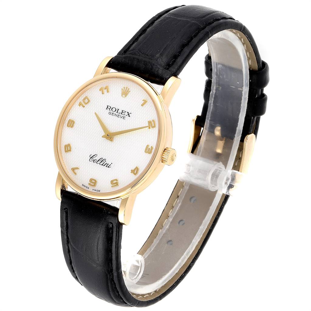 The image shows a Rolex Cellini 5115 Men's Yellow Gold Mother of Pearl Dial 5115 Men's Yellow Gold Mother of Pearl Dial watch angled slightly to the side, featuring its gold case, white dial, and black leather strap.