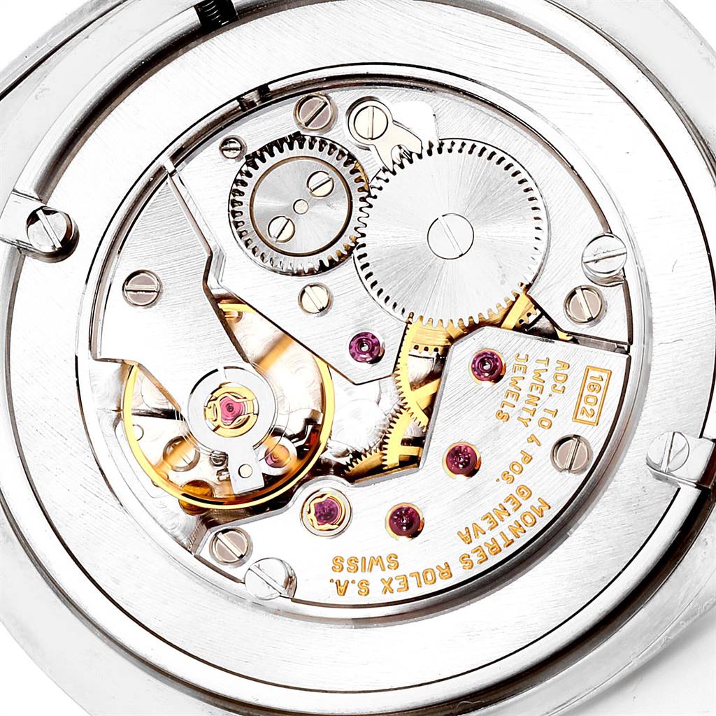 This image shows the intricately detailed movement and inner mechanisms of a Rolex Cellini 4233 Men's White Gold White Dial 4233 Men's White Gold White Dial watch.
