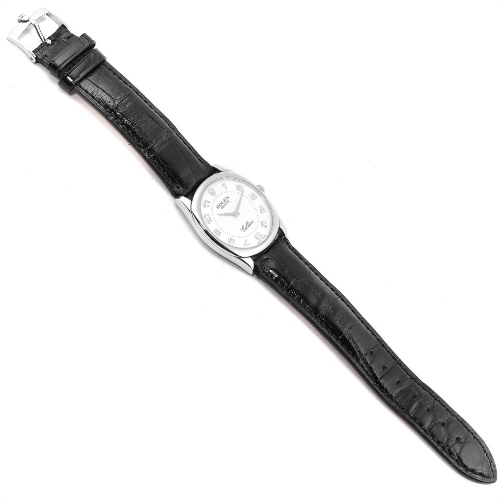 The image shows a Rolex Cellini 4233 Men's White Gold White Dial 4233 Men's White Gold White Dial watch laid flat, displaying the black leather strap, silver case, and white dial.