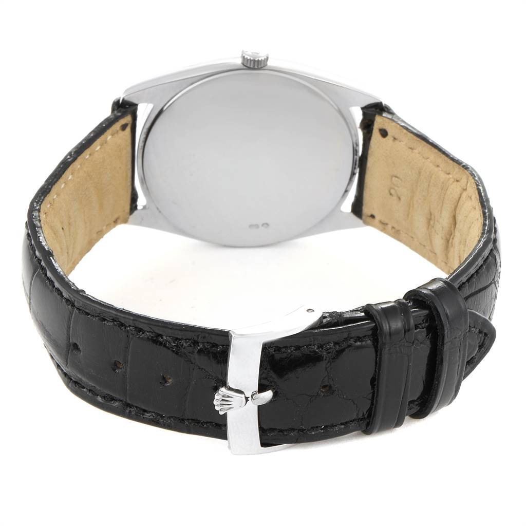 The image shows the back view of a Rolex Cellini 4233 Men's White Gold White Dial 4233 Men's White Gold White Dial watch, focusing on the case back and black leather strap with buckle.