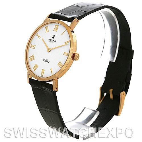 The image shows a Rolex Cellini 4112 Yellow Gold White Dial 4112 Yellow Gold White Dial watch in a three-quarter angle, highlighting its dial, crown, and leather strap.