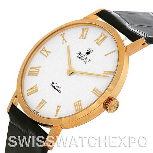 The image shows a close-up side angle of a Rolex Cellini 4112 Yellow Gold White Dial 4112 Yellow Gold White Dial watch, featuring its gold case, white dial, and black leather strap.
